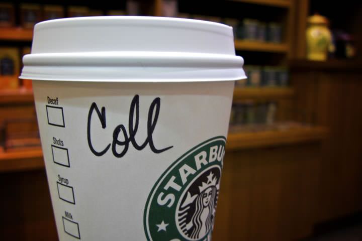 'Coll' written on the side of a Starbucks cup